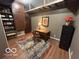 Functional office space includes a desk, filing cabinet, and ample storage for organized productivity at 350 W Pearl St, Greenwood, IN 46142