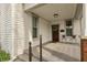 Inviting front porch with seating, perfect for relaxing and enjoying the outdoors at 350 W Pearl St, Greenwood, IN 46142