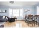 Bright living room with hardwood floors, comfortable seating, and modern decor at 356 S Washington St, Danville, IN 46122