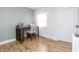 Bright office space with wood-look floors and natural light, perfect for a productive work environment at 356 S Washington St, Danville, IN 46122