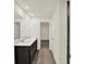 Bathroom featuring a double sink vanity, tile floor, and walk in closet creating a functional and stylish space at 3727 Thomas Jefferson Ct, Westfield, IN 46074