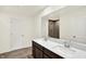 Bright bathroom with a double sink vanity and a large mirror reflecting a tiled shower at 3727 Thomas Jefferson Ct, Westfield, IN 46074