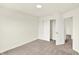 Bedroom with neutral carpet, access to an open closet, and a view of another room, ready for personalization at 3727 Thomas Jefferson Ct, Westfield, IN 46074