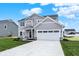 Inviting two-story home featuring stone accents, a two-car garage, and a well-maintained lawn at 3727 Thomas Jefferson Ct, Westfield, IN 46074