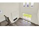 Spacious living room with high ceilings, a modern fireplace, and large windows for natural light at 3727 Thomas Jefferson Ct, Westfield, IN 46074