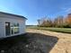 Scenic backyard view of a pond and green space, accessible via sliding glass doors at 3847 Thomas Jefferson Ct, Westfield, IN 46074