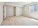 Unfinished basement with neutral carpet, closet and window at 3932 Long Ridge Blvd, Carmel, IN 46074