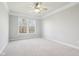 Spacious and bright bedroom with a large window and plush carpeting at 3932 Long Ridge Blvd, Carmel, IN 46074