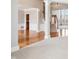 Open concept foyer with hardwood floors, carpet, stairs, and natural light at 3932 Long Ridge Blvd, Carmel, IN 46074