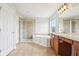 Main bathroom featuring a shower, soaking tub, dual sink vanity, and tile floors at 3932 Long Ridge Blvd, Carmel, IN 46074