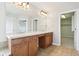 Main bathroom featuring a dual sink vanity, and tile floors at 3932 Long Ridge Blvd, Carmel, IN 46074