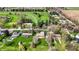 Scenic aerial view of property with mature trees, lush lawn and professional landscaping at 3991 Clubhouse Dr, Greenfield, IN 46140