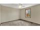 Bright bedroom featuring neutral carpet and a window overlooking greenery at 3991 Clubhouse Dr, Greenfield, IN 46140