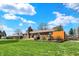 Charming single-story brick home with a well-kept front lawn and mature landscaping at 3991 Clubhouse Dr, Greenfield, IN 46140