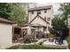 Inviting backyard with deck, patio, fire pit, and lush landscaping perfect for relaxing and entertaining at 40 N Ritter Ave, Indianapolis, IN 46219