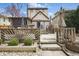 Multi-level deck with lush landscaping, inviting backyard is perfect for relaxing and entertaining Gathering and friends at 40 N Ritter Ave, Indianapolis, IN 46219