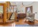 Elegant foyer with hardwood floors, a staircase, and a classic chandelier at 40 N Ritter Ave, Indianapolis, IN 46219