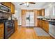 Well-appointed kitchen with stainless steel appliances, and charming backsplash at 40 N Ritter Ave, Indianapolis, IN 46219