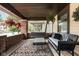 Inviting front porch with a comfortable seating area, perfect for relaxing outdoors at 40 N Ritter Ave, Indianapolis, IN 46219