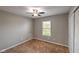 Bedroom with carpet, ceiling fan, and a window letting in natural light at 416 Concord Way, Greenwood, IN 46142