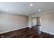 Large living room featuring wood-look flooring, neutral paint colors, and recessed lighting at 416 Concord Way, Greenwood, IN 46142