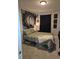 Bedroom featuring carpet, a decorative tapestry, and a bed with stylish linens at 422 Hege Ave, Columbus, IN 47201