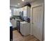 Updated kitchen with white cabinetry, stainless steel appliances, and modern countertops at 422 Hege Ave, Columbus, IN 47201