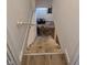 Unfinished basement stairway leading to lower level at 422 Hege Ave, Columbus, IN 47201