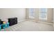 Spacious bedroom with two large windows providing ample natural light at 4281 Honeysuckle Ln, Zionsville, IN 46077