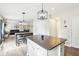 Bright and airy kitchen featuring an island and seamless flow into the living spaces at 4281 Honeysuckle Ln, Zionsville, IN 46077