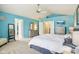 Spacious main bedroom with blue walls, a vaulted ceiling, and carpet flooring at 4281 Honeysuckle Ln, Zionsville, IN 46077