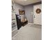 This garage offers a welcoming entrance with a decorative wreath and ample storage solutions at 4383 Round Lake Bnd, Indianapolis, IN 46234