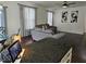 Open-concept living room features hardwood floors, natural lighting, and stylish decor at 4383 Round Lake Bnd, Indianapolis, IN 46234