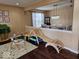 Playroom and dining room combo with fun play area adjacent to formal dining at 4383 Round Lake Bnd, Indianapolis, IN 46234