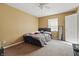 Bedroom featuring a ceiling fan, comfortable bed, and lots of natural light at 443 N Alton Ave, Indianapolis, IN 46222