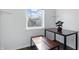 Dining area with table, bench, and a bright window at 443 N Alton Ave, Indianapolis, IN 46222