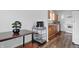 Dining area with breakfast nook, wine rack, and open kitchen at 443 N Alton Ave, Indianapolis, IN 46222