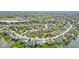 Aerial view of a residential neighborhood with many trees at 476 Sapphire Dr, Carmel, IN 46032