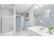 Well-lit bathroom featuring a shower-tub combo and a single sink vanity at 476 Sapphire Dr, Carmel, IN 46032
