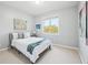 Cozy bedroom featuring neutral colors, large windows, and comfortable bedding at 476 Sapphire Dr, Carmel, IN 46032