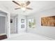 Cozy bedroom featuring a ceiling fan, natural light, and a calming aesthetic at 476 Sapphire Dr, Carmel, IN 46032
