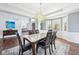 Beautiful dining room with wood floors and a view of the entryway and living room at 476 Sapphire Dr, Carmel, IN 46032