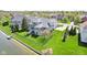 Stunning two-story home with a beautiful lawn that extends to the water and features a private dock at 476 Sapphire Dr, Carmel, IN 46032