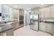 Well-equipped kitchen with stainless steel appliances, granite countertops, and ample cabinet space at 476 Sapphire Dr, Carmel, IN 46032