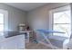 A spacious laundry room featuring sleek flooring, bright windows, and built in storage at 504 S Lebanon St, Lebanon, IN 46052