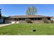 Charming brick home features a two-car garage and a well-maintained lawn at 508 E Hillside Dr, Anderson, IN 46011