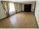 Spacious living room with hardwood floors and large windows allowing ample natural light at 508 E Hillside Dr, Anderson, IN 46011