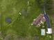 Aerial view of a home, pool, stream, patios, and long driveway at 5455 S 800 E, Zionsville, IN 46077