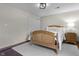A serene bedroom featuring hardwood floors and a neutral color palette at 5455 S 800 E, Zionsville, IN 46077