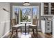 Cozy breakfast nook with bay window, hardwood floors, and inviting ambiance at 5455 S 800 E, Zionsville, IN 46077